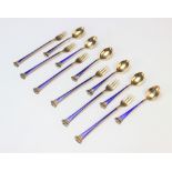 A twelve piece Danish silver gilt and enamel cutlery set by Egon Lauridsen, comprising six coffee