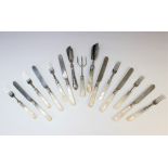 A set of twelve silver and mother of pearl handled fruit knives and forks, John Gammage,