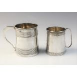 A George III silver tankard by George Knight, London 1818, of tapered cylindrical form with reeded