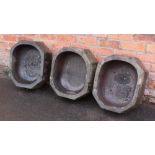 Three salt-glazed stoneware feed troughs, early 20th century, each of octagonal form, 18cm H x