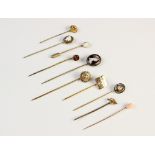 A selection of Victorian and later stick pins, to include a silver gilt ?Parker? example set with