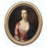 Circle of Sir Godfrey Kneller (1646-1723), Portrait of a young lady, half length, wearing a pink