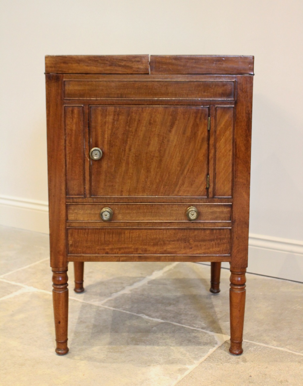 A George III and later mahogany cellarette, converted from a commode chest, the twin hinged top - Image 2 of 3