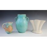 A Fulham Pottery Art Deco vase, the plain white glazed exterior of fan shape, impressed marks to the