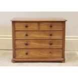 A Victorian mahogany apprentice chest, the rectangular thumb moulded top with rounded front corners,