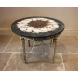 An Italian painted marble top circular table, on fluted legs, 48cm H x 62cm diameter Provenance: