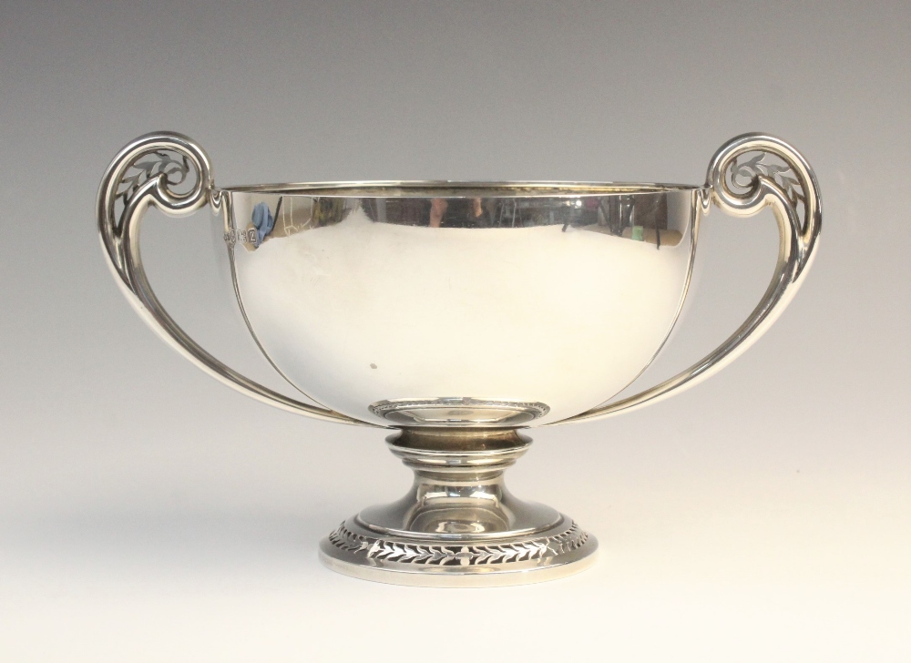 A George V twin-handled silver pedestal dish by Deakin & Francis, Birmingham 1924, of circular