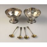 A matched pair of Victorian silver bon-bon dishes, one marked for London 1857, the other for 1870 (