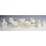 A collection of Belleek china, mid 20th century, comprising: two shell cups and saucers, a '