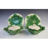 A pair of Portugese cabbage dishes, 20th century, each realistically modelled and formed as a