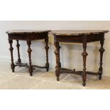 A pair of William and Mary walnut console side tables, the shaped serpentine, demi-lune top raised