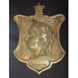 A Victorian cast brass wall plaque, late 19th century, commemorating Queen Victoria's Diamond