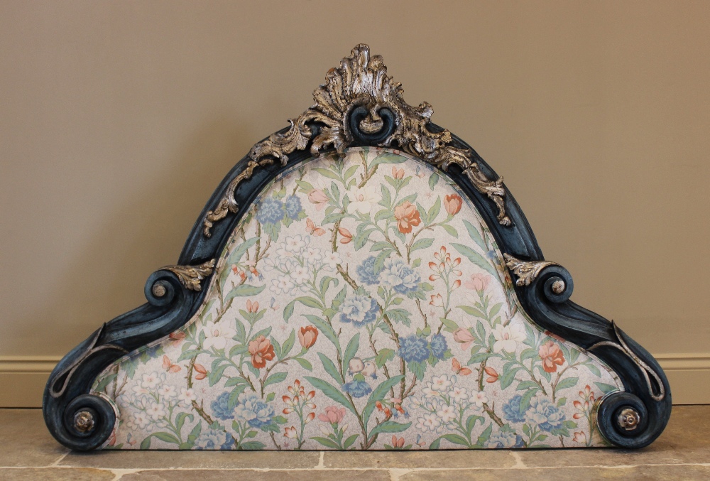 An Italian 18th century and later gesso headboard, later painted, the shell crest extending to
