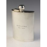 A George V silver hip flask by F Burton Crosbee, Birmingham 1942, of curved rectangular form with