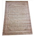 A fine woven bamboo silk rug, with a bespoke medallion design against a silvered ground, full