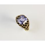 A sapphire ring, the central untested rectangular step cut light blue sapphire measuring