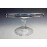 A glass tazza of large proportions, late 18th/early 19th century, the lipped top raised on a