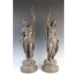 A pair of early 20th century bronzed spelter figural lamps, modelled as an archer wearing flowing