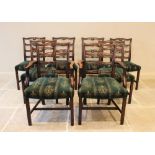 A set of eight Chippendale style mahogany dining chairs, early 20th century, each with an interlaced