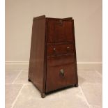 A George III mahogany pyramid cellarette pedestal, of tapered square section form, with cupboard,