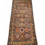 A West Turkish geometric runner, decorated with an all-over divided square pattern, within a border,