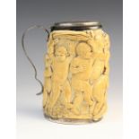 A carved ivory kinderbacchanal tankard attributed to Johann Jacob Betzoldt (1621-1701), German circa