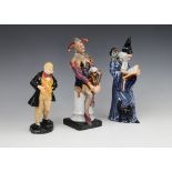 Three Royal Doulton figurines, comprising: HN2016 'The Jester', HN2877 'The Wizard' and HN2097 '