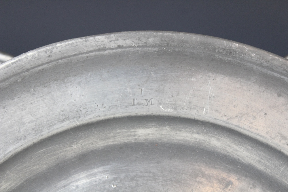 A pewter charger, of typical form with 'I P S' stamped to the rim, probably made by W. Cooke, - Image 2 of 4