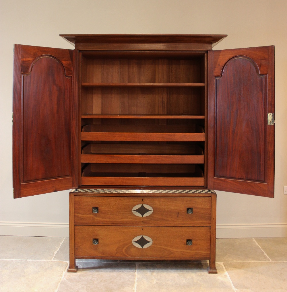 An early 20th century mahogany Arts & Crafts linen press, in the manner of Ambrose Heal, the cavetto - Image 10 of 12