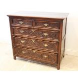 A 17th century and later oak chest of drawers, the twin plank top over an arrangement of two short