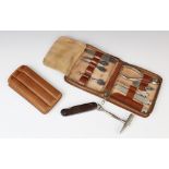 A cased travelling tool kit by Dreizack Solingen of Germany, 20th century, comprising