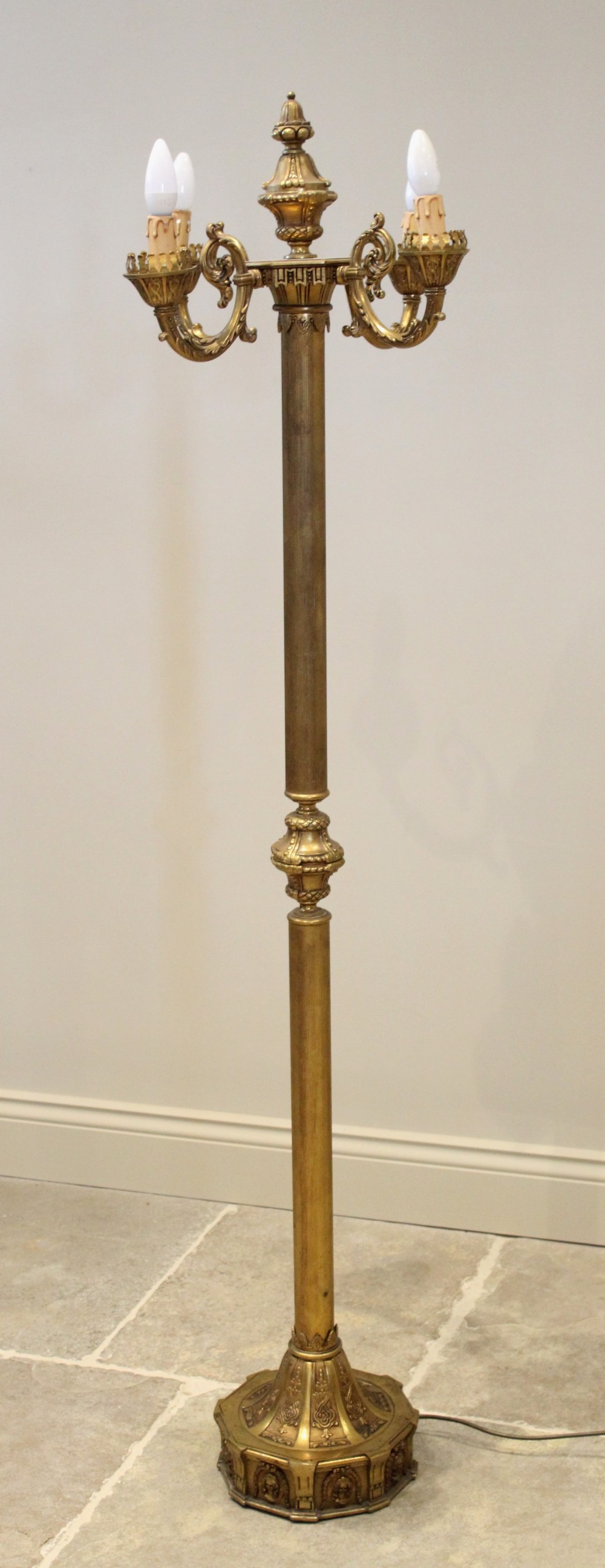 An Italian gilt metal standard lamp, mid 20th century, stamped 'F.B.A.L Italy' to underside of base,