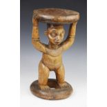 A West African Cameroon grassland stool with figure, 42.5cm high