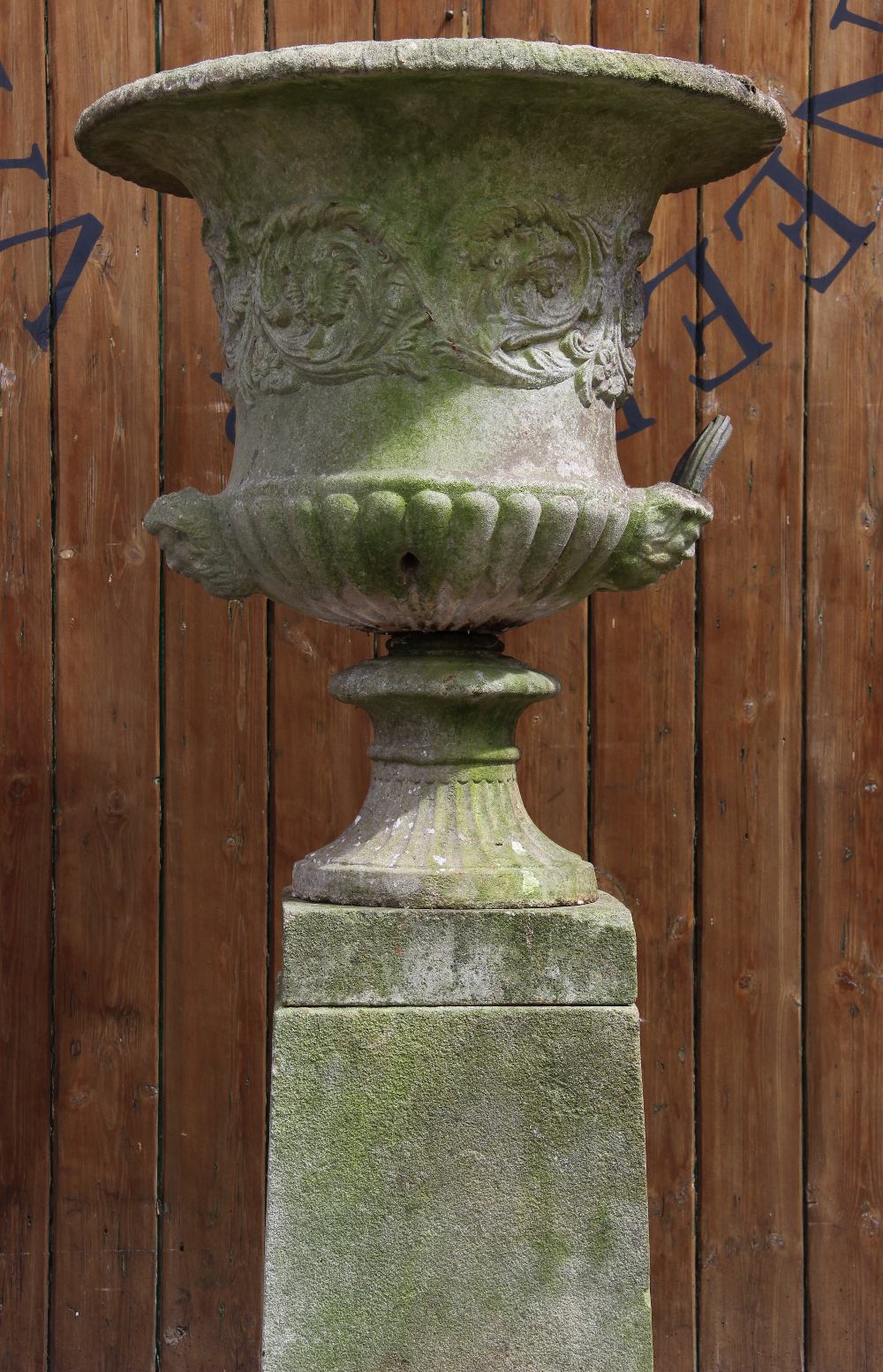 A reconstituted stone campana garden urn, of typical lobed form, moulded in relief with scrolling - Image 2 of 6