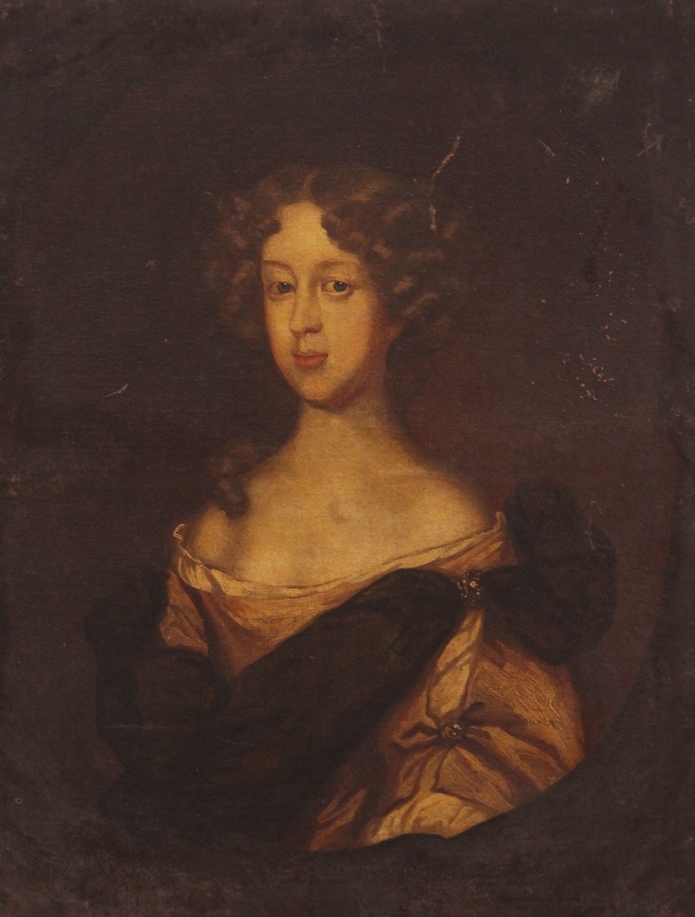 Follower of Sir Godfrey Kneller (1646-1723), Portrait of a young lady in a painted, Oval oil on