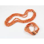 A Victorian three row coral beaded choker necklace, comprising three rows of graduated polished