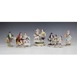 A Volkstedt porcelain figural group, mid 20th century, modelled as a gentleman reading to a lady,