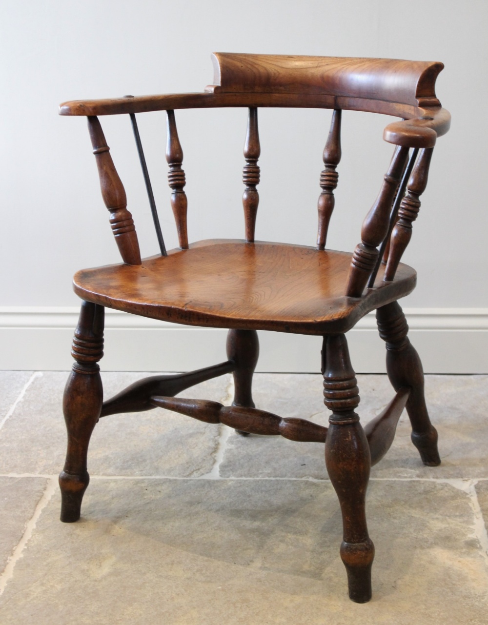 A late 19th century elm and beech smokers bow elbow chair, the 'C' shaped top rail raised upon - Image 2 of 3