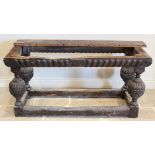 A 17th century and later oak table, the associated later plank top above a gadrooned frieze raised