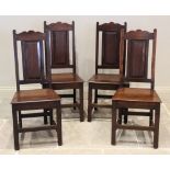 A set of six 18th century style oak dining chairs, late 19th/early 20th century, each with a panel
