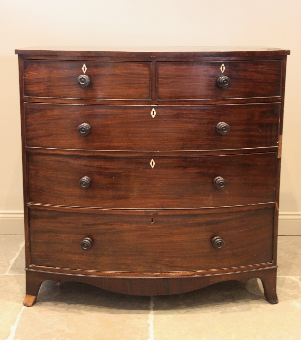 An early 19th century mahogany bow front chest of drawers, with an arrangement of two short over - Image 2 of 2