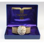 A Gentleman's vintage 9ct gold Tissot wristwatch, the circular silver dial with baton markers, set