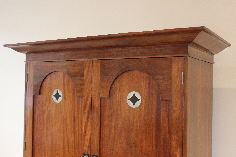 An early 20th century mahogany Arts & Crafts linen press, in the manner of Ambrose Heal, the cavetto - Image 9 of 12