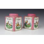 A pair of English porcelain tea caddies and covers, 20th century, each of square form, printed and
