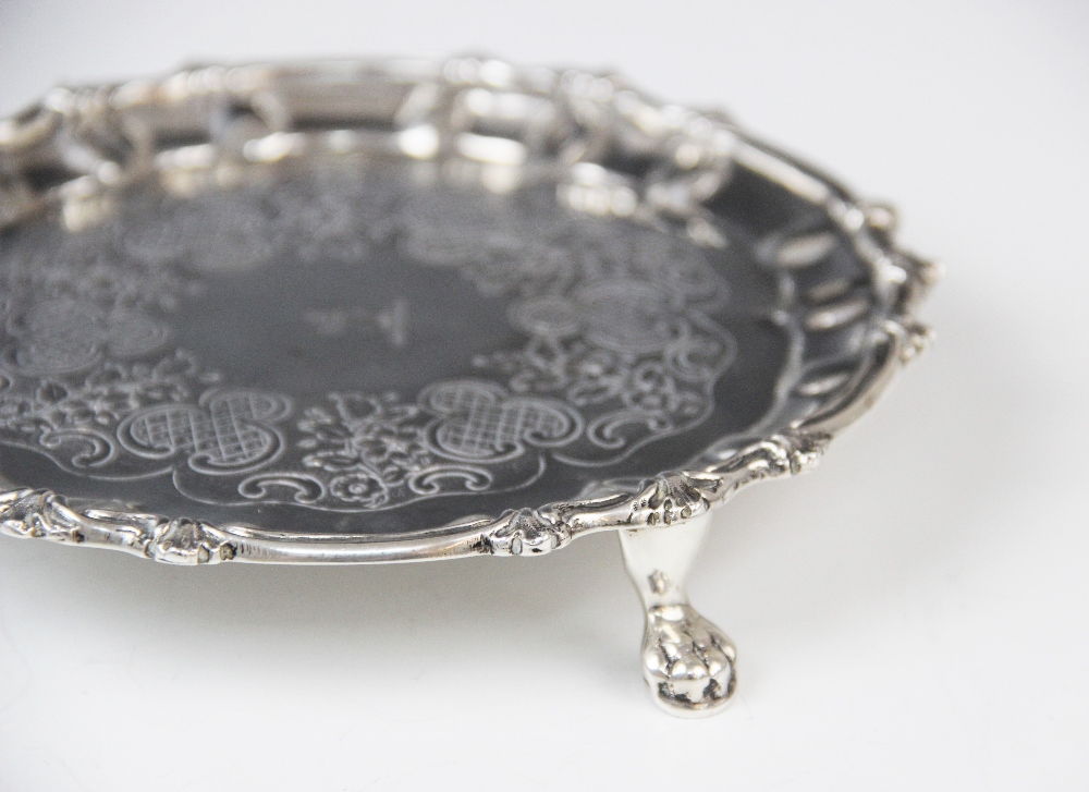 A George III Irish silver waiter, possibly by Thomas Townsend, of circular form with scalloped