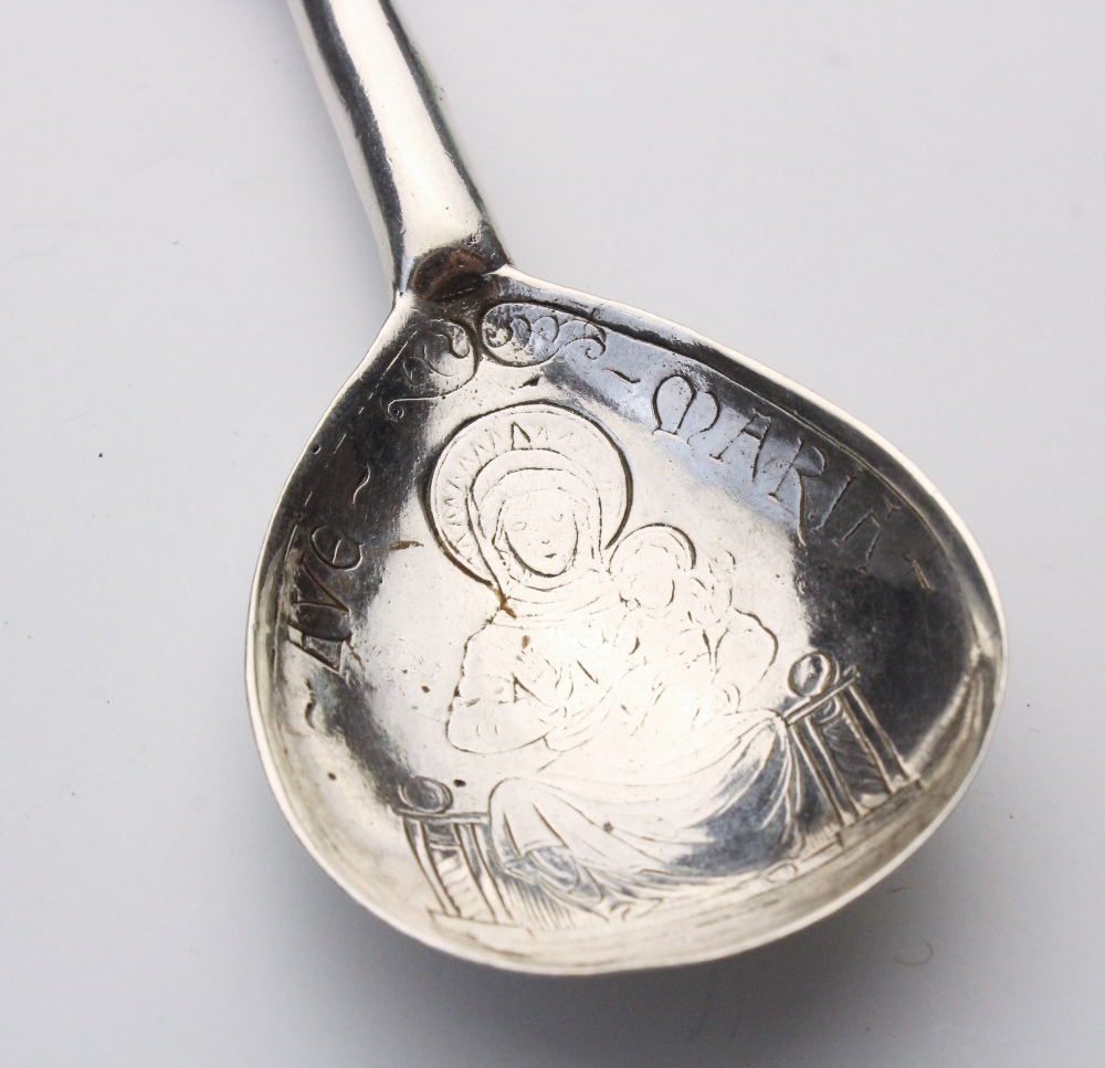 A continental silver spoon, the fig shaped bowl engraved with Mary and Jesus and inscribed 'Ave - Image 3 of 6