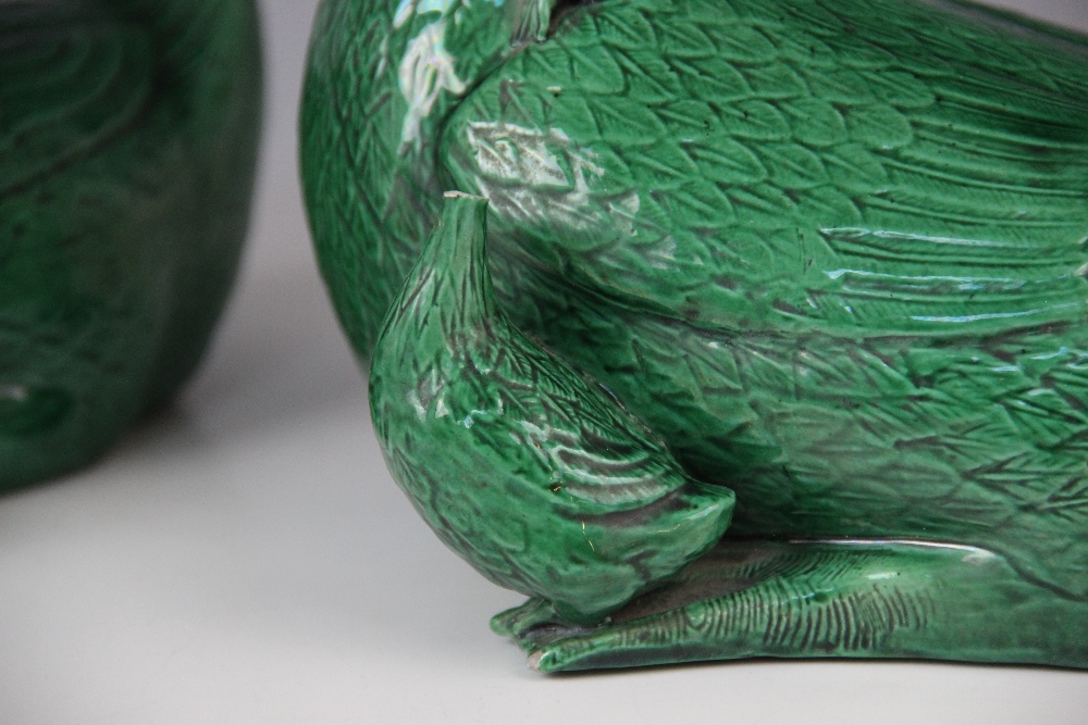 A pair of Chinese porcelain green glazed ducks, early 20th century, each modelled with two - Image 2 of 4