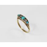 An early 20th century turquoise and diamond five stone ring, comprising three round turquoise