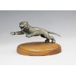 A cast metal car mascot, early 20th century, probably by Desmo, naturalistically modelled as a