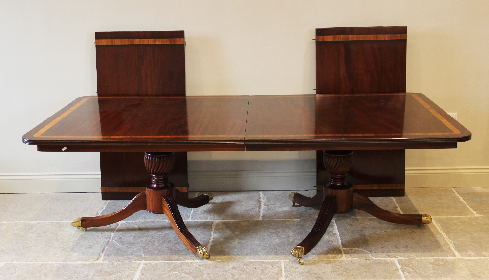 A Regency style twin pillar mahogany dining table, late 20th century, the rectangular satinwood - Image 5 of 6